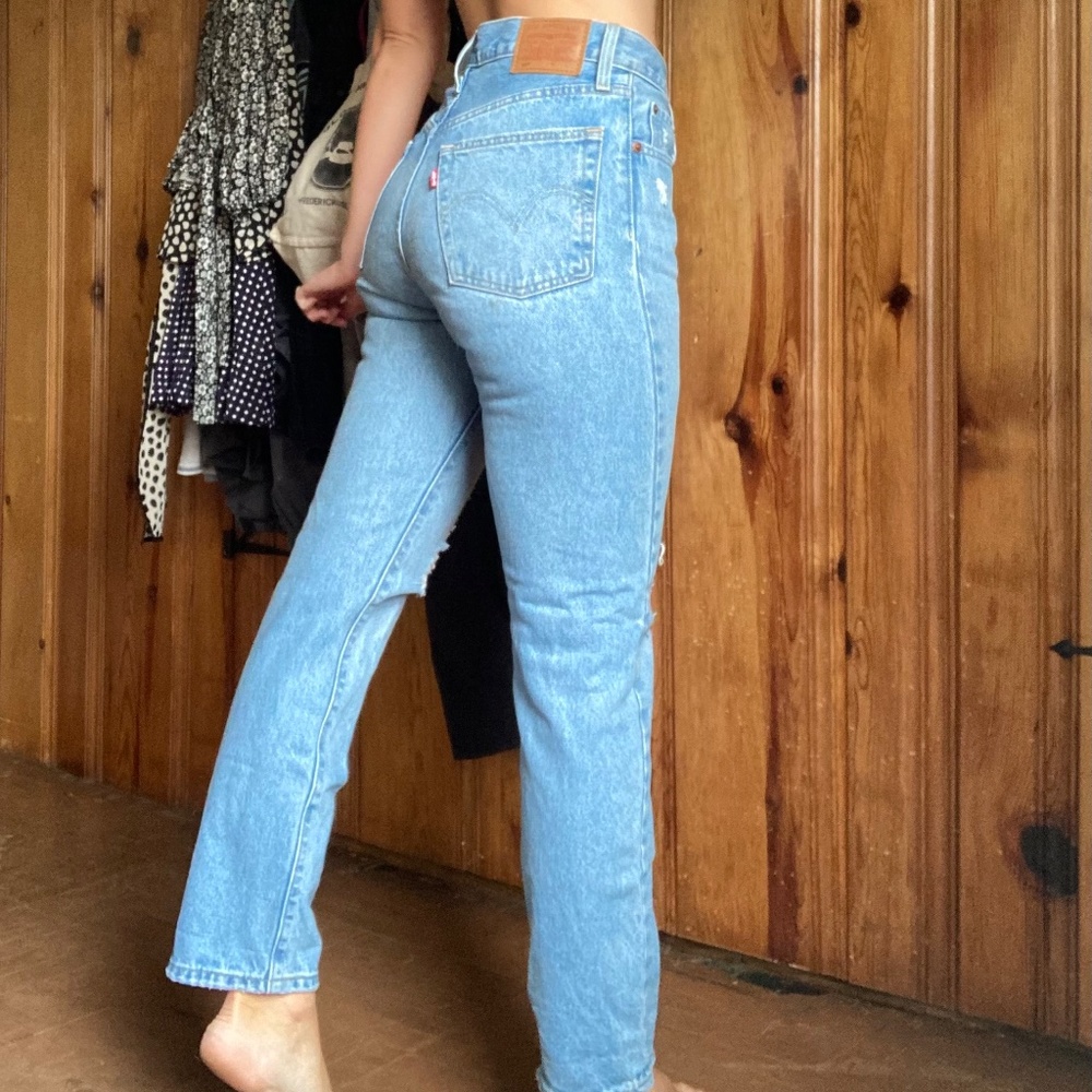 Levi Strauss distressed button up blue jeans